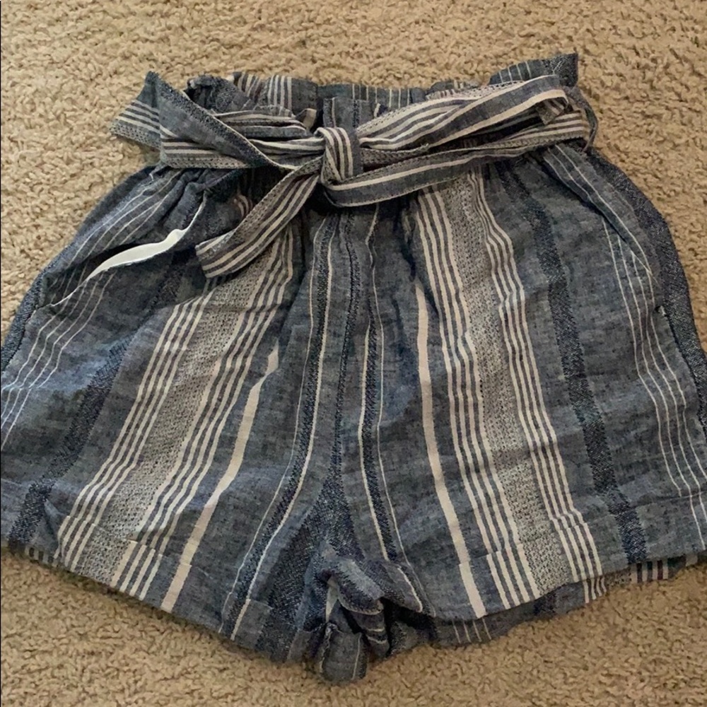 High rise shorts. Never worn. Size xs.